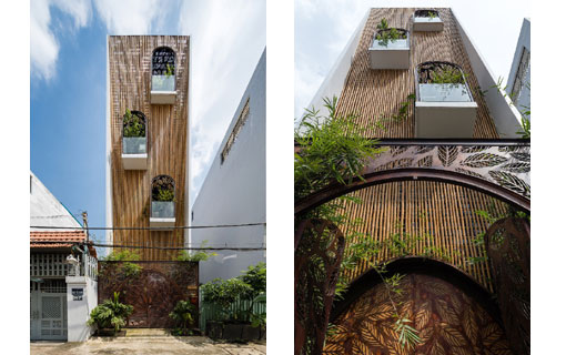 Une maison-tube avec façade en bambou dans le district 3 de Ho Chi Minh Ville Une maison-tube avec façade en bambou dans le district 3 de Ho Chi Minh Ville